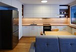 kuchyňe propojená s obývacím pokojem